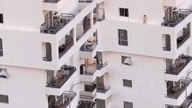 viral-video-of-toddler-walking-on-wall-edge-from-multiple-storey-window-to-balcony-triggers-internets-anxiety